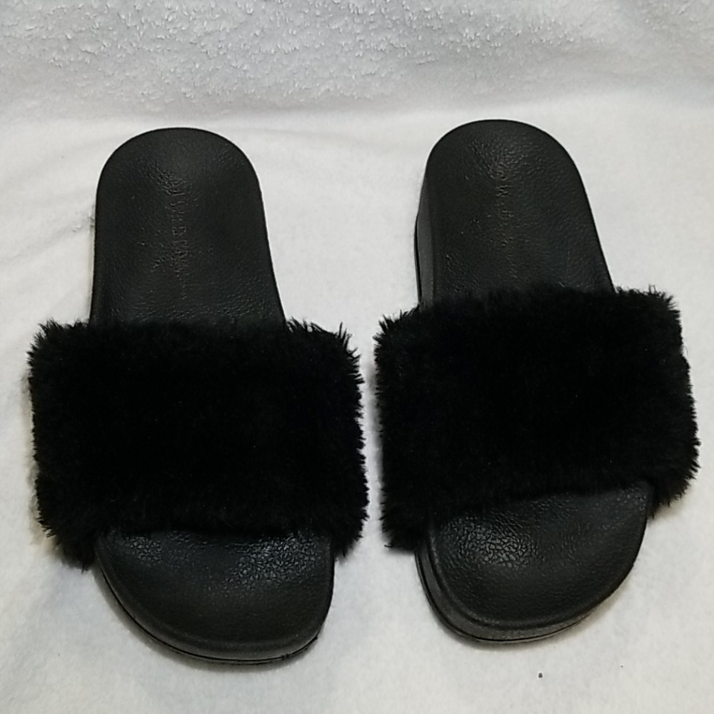 Women's size five black fur platform sandals
